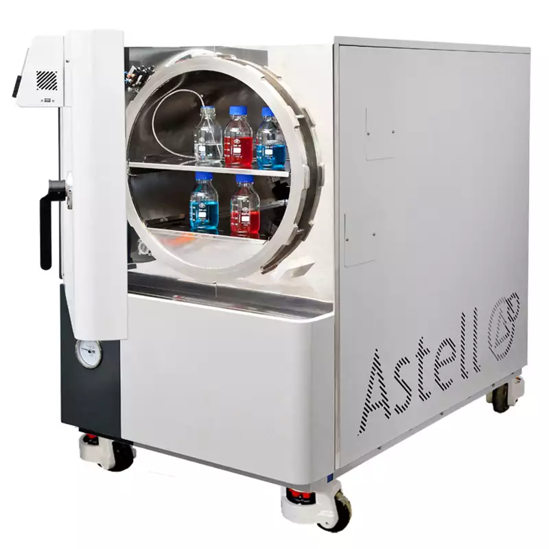 Large front loading autoclave with open door, showing shelf and load sensed process timing options