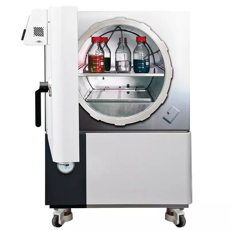 Front view of large front loading autoclave with open door, showing shelf and load sensed process timing options
